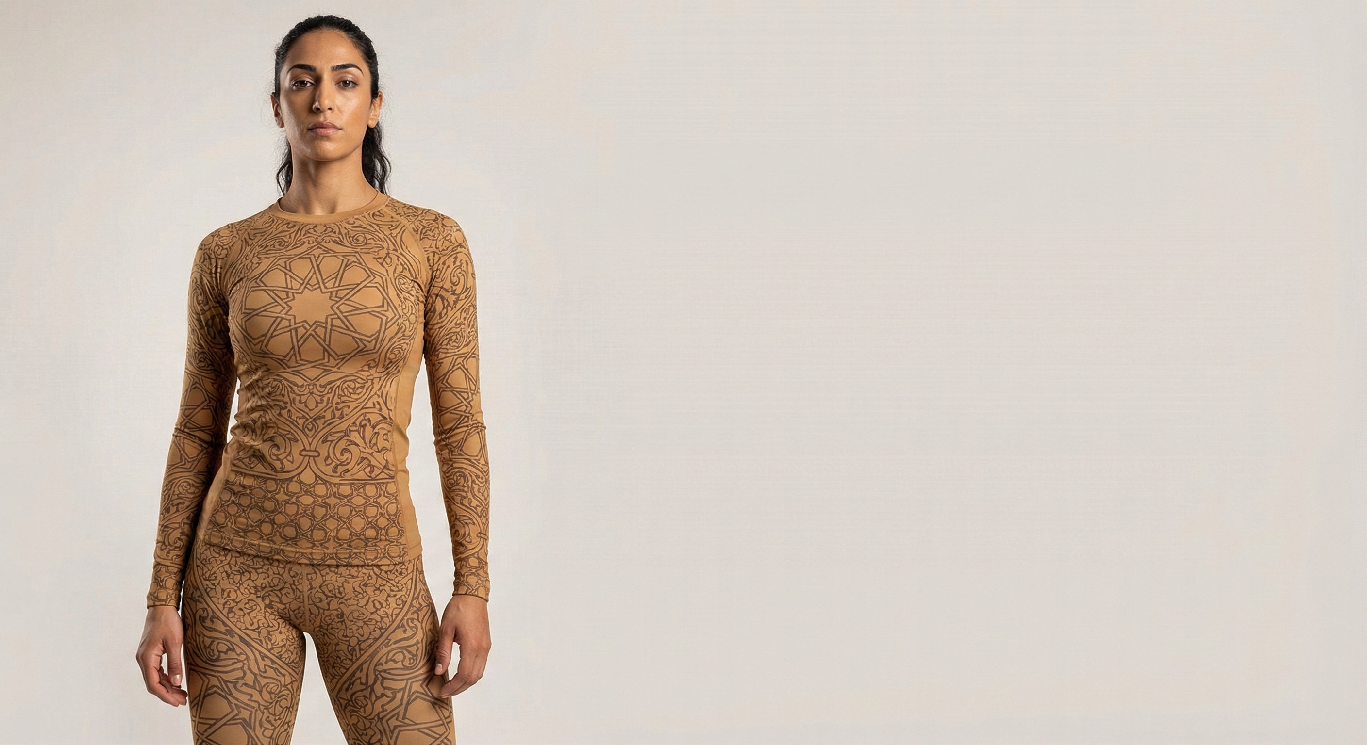 Woman in geometric pattern studio shoot